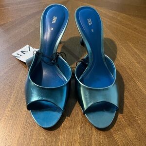 Metallic blue mules